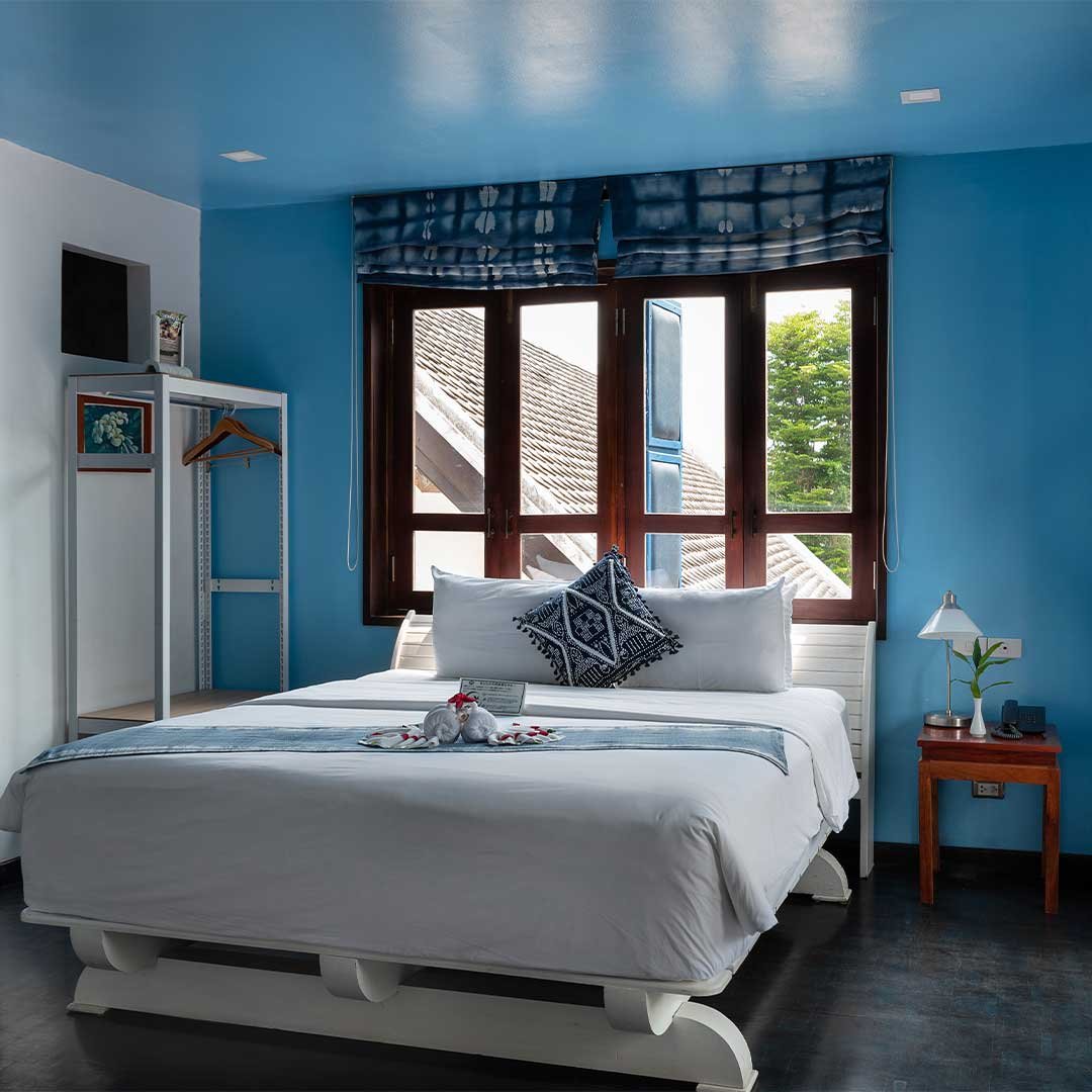 Deluxe room with wardrobe space, boutique hotel for long stays in Luang Prabang
